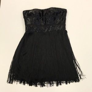 Black beaded, fringed cocktail dress.